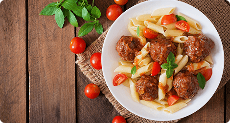 Dense meal with meatballs and pasta